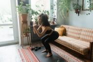 Squat thrusts are one of the best low-impact exercises. (Photo via Pexels/MART PRODUCTION)